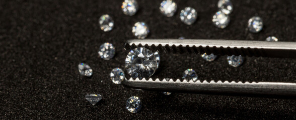 Diamonds are valuable, expensive and rare. For making jewelry. brilliant cut diamond held by...