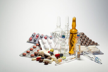 pharmaceuticals antibiotics pills medicine, colorful antibacterials pills on white background, capsule pill medicine