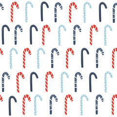 Seamless pattern with candy cones. Blue and red Christmas sweets print. Vector hand drawn illustration.