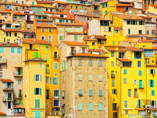 Colorful houses in old part of Menton, French Riviera, France. tourist attraction, travel guide and...
