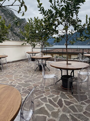 Cafe terrace. Outdoor restaurant table and chairs. Breakfast, dining concept