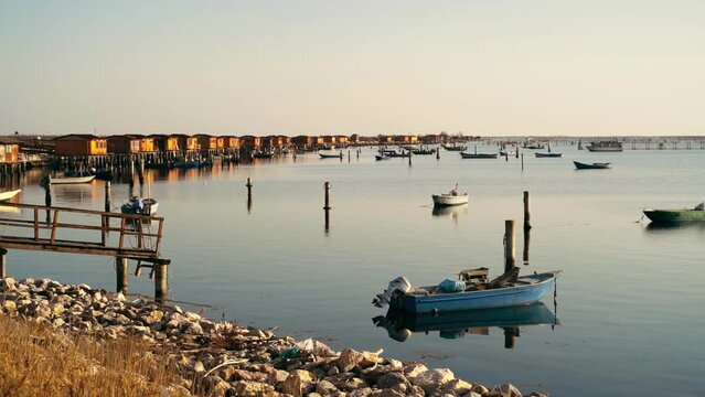 Sunset in Sacca di scardovari, Delta del Po, Comacchio lagoon, sunny day in Veneto, Emilia Romagna, Italy.  Calm and peaceful concept and atmosphere. Sunset Rovigo sea