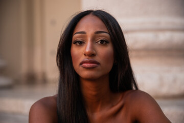 Portrait of a gorgeous black model looking thoughtfully ahead of the camera