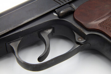 A part of a gun on white background
