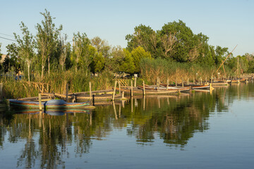 Catarroja traditional boats port (pier) in the Valencia Albufera natural park at sunset