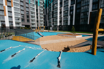 a new playground for active recreation and workout in a modern courtyard of a residential area