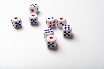 White bones on the background. Game devices. Copy space for text. The concept of a game of chance.