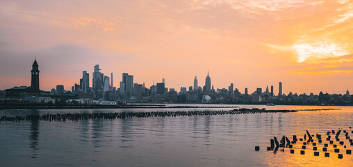 Fototapeta premium sunset over the harbor landscape New York City 