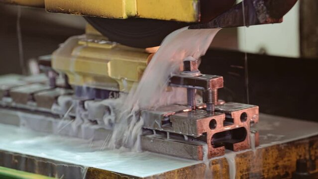 The part is processed on a water-cooled machine. The bed moves from side to side