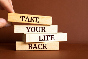 Wooden blocks with words 'Take Your Life Back'.