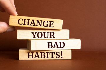 Wooden blocks with words 'Change Your Bad Habits'.