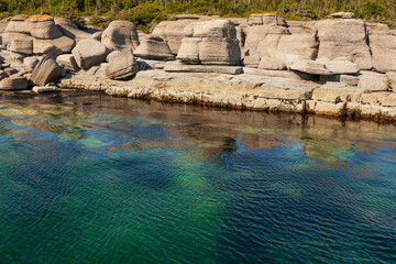 Monoliths under a beautiful blue sky in Mingan Archipelago National Park Reserve of Canada, Quebec, Canada