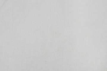 Snow white cotton cloth background. Surface of fabric texture in white winter color.