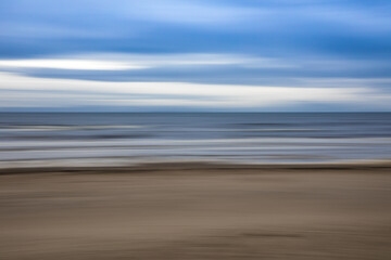 Abstract of sand, water and sky