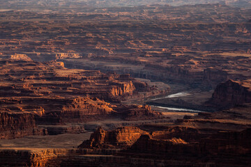 The Colorado River Passes Through Red Cliffs Outside Canyonlands National Park