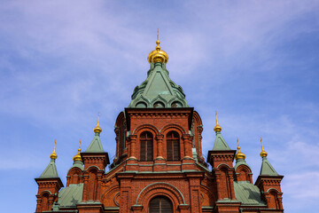 Fototapeta na wymiar Detail of the ornate domes of the Uspenski Cathedral in Helsinki