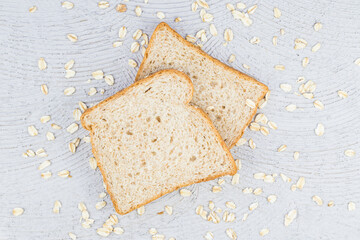 top view, meal organic whole grain sliced ​​bread with oats on dining room