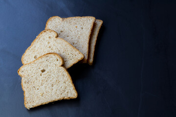 meal organic whole grain sliced ​​bread with oats on dining room