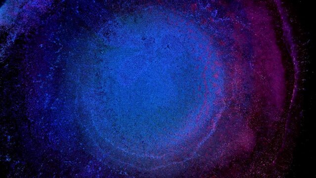 Neon purple blue pink and glitter inks splash. Chemical reaction macro, micro explosion. Decorative liquid abstract background. The Universe Cosmos Eye of God Nebula