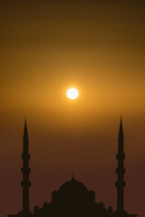 silhouette islamic mosque on sunrise sky background