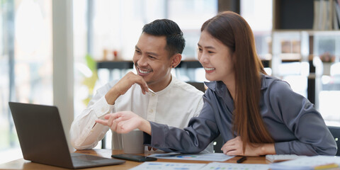 Business Woman or Accountant do math and analyze with calculator and paperwork on desk, account, audit and saving concept