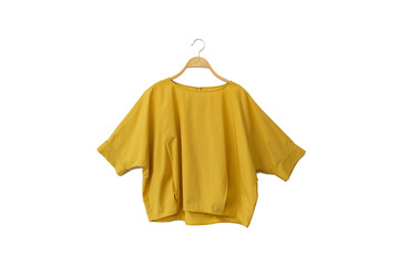 Minimal style.Yellow woman clothes is clothes hanger on white background.close up