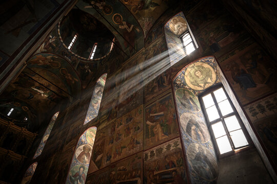 Rays of light illuminating the inside view of the Assumption Cathedral in the Holy Trinity Sergius Lavra, built in 1585. Sergiev Posad, Russia