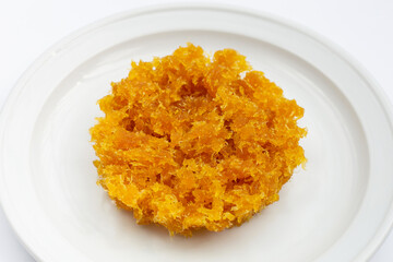 Pineapple paste or jam on white background.