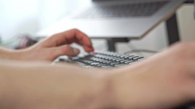 A common office worker scene.  A close-up of hands getting started typing on a modern computer keyboard