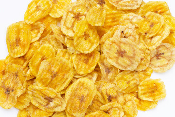 Banana slice chips on white background.