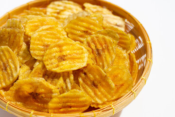 Banana slice chips on white background.