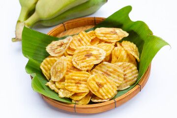 Banana slice chips on white background.