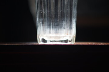 Under the bottom of the glass, sunlight passed down.