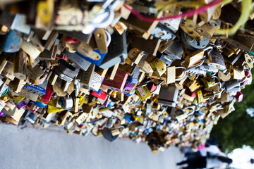 Fototapeta na wymiar Bridge full of locks in Paris france, love tourism, couples symbol