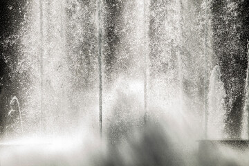 close up of water fountain violently splashing jets splash