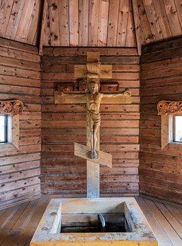 Wooden carved Holy Crucifixion of Jesus Christ on the cross over the holy spring. Spaso-Yakovlevsky Dimitriev Monastery. Rostov, Russia.