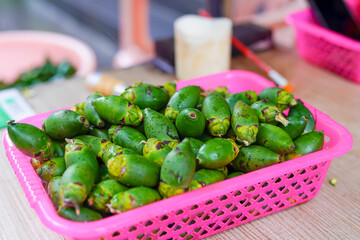 Green betel nut in the market