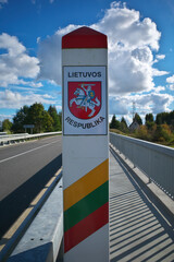 Border post on the border of Lithuania. Inscription: Republic of Lithuania. Selective focus.