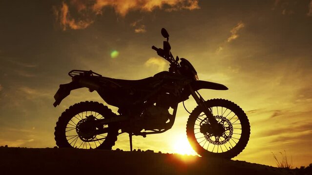 Motocross bike on the mountain in the evening hobbies and freedom ideas