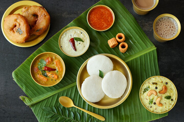 Many Idli or idly popular breakfast of Kerala South India and Sri Lanka. Banana leaf healthy...