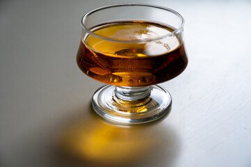 Glass of apple cider drink on white table, Normandy, France