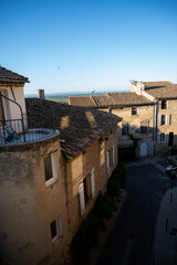 VIew on medieval buildings in sunny day, vacation destination wine making village Chateauneuf-du-pape in Provence, France