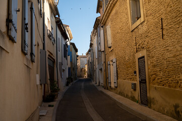 VIew on medieval buildings in sunny day, vacation destination wine making village Chateauneuf-du-pape in Provence, France