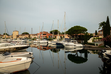 Fototapeta na wymiar Colorful houses in Port Grimaud, village on Mediterranean sea with yacht harbour, Provence, France
