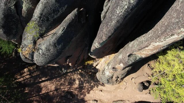 Flight over the rocks in the national park, aerial shot