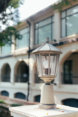 white old street lamp on the street