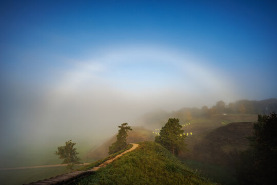 Moonbow or nocturnal rainbow at night, mystic view