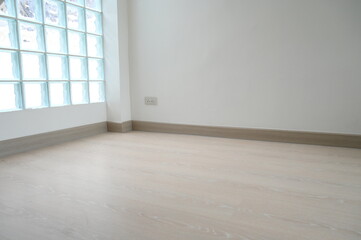 Fototapeta premium wooden floor with glass block wall