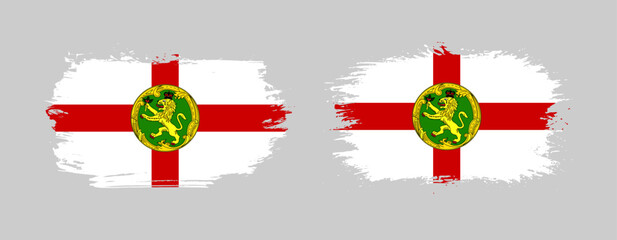 Set of two grunge brush flag of Alderney on solid background