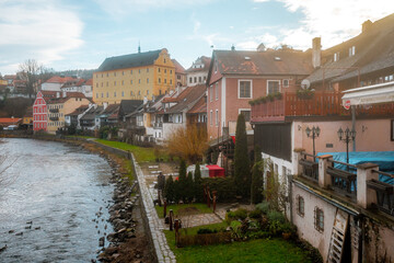 Beautiful view and cityscape along Vltava River in Cesky Krumlov , medieval and romantic town during winter. Cesky Krumlov , Czech  : December 15, 2019